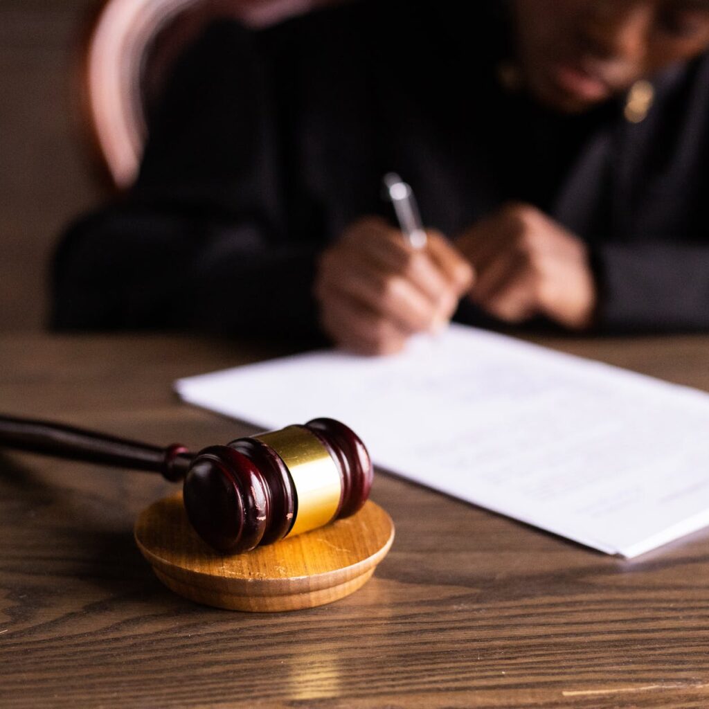 a judge signing a child support order